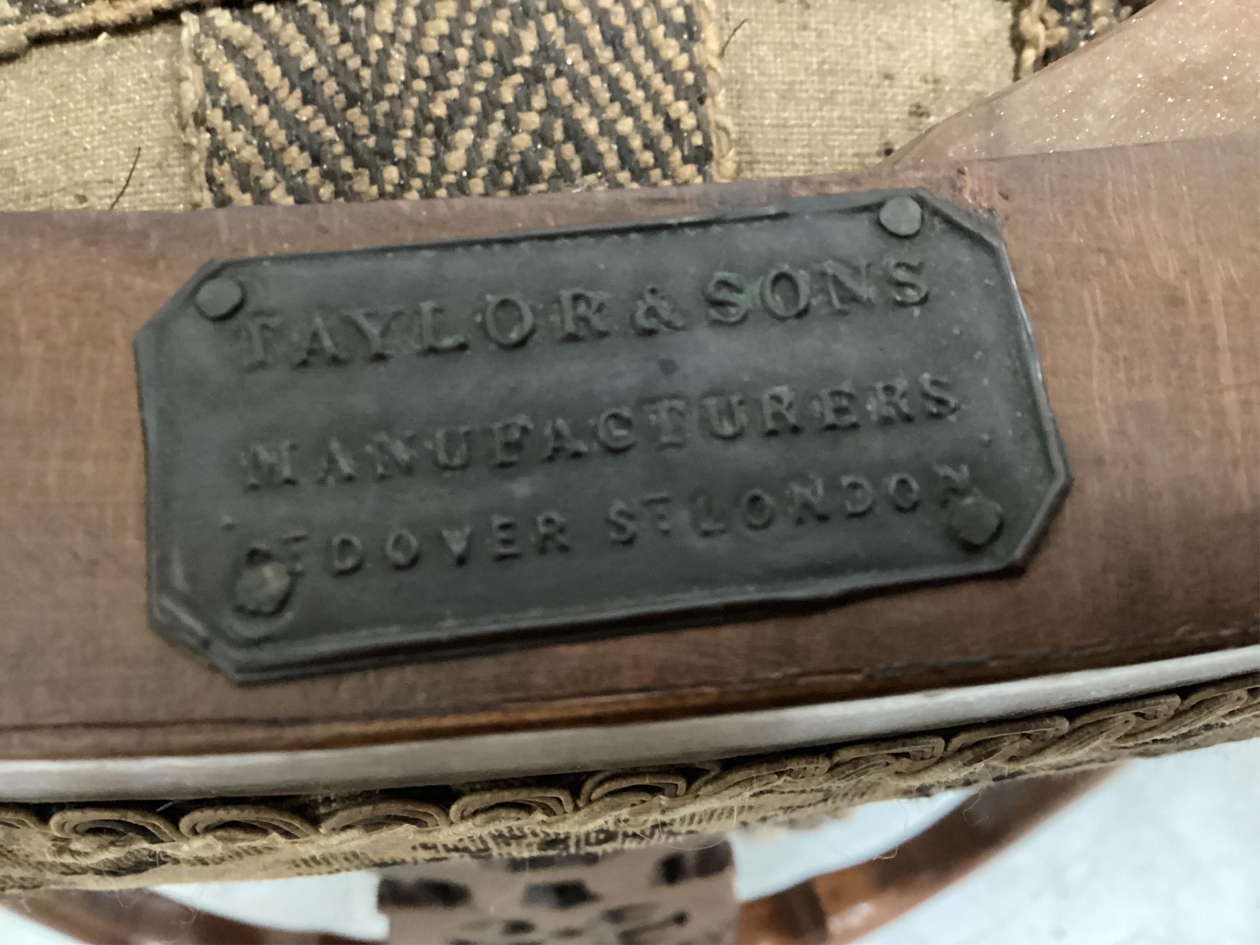 A set of four Victorian carved walnut dining chairs, bearing label - ‘’Taylor & Sons, Furniture Manufacturer, Dover Street, London’’, together with a mid Victorian inlaid walnut oval topped dining table, table width 130c